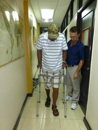 Man walking with new above-knee prosthesis